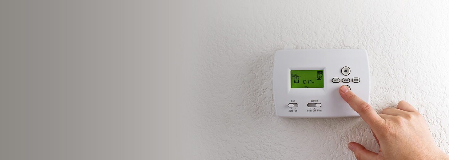 setting a home thermostat to 70 degrees